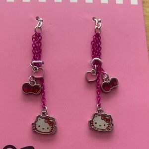 Hello Kitty Dangle Earrings with heart and bow. NWT.